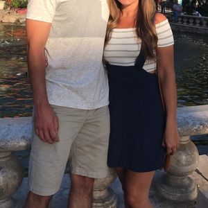 Blue overall dress from Urban Outfitters.